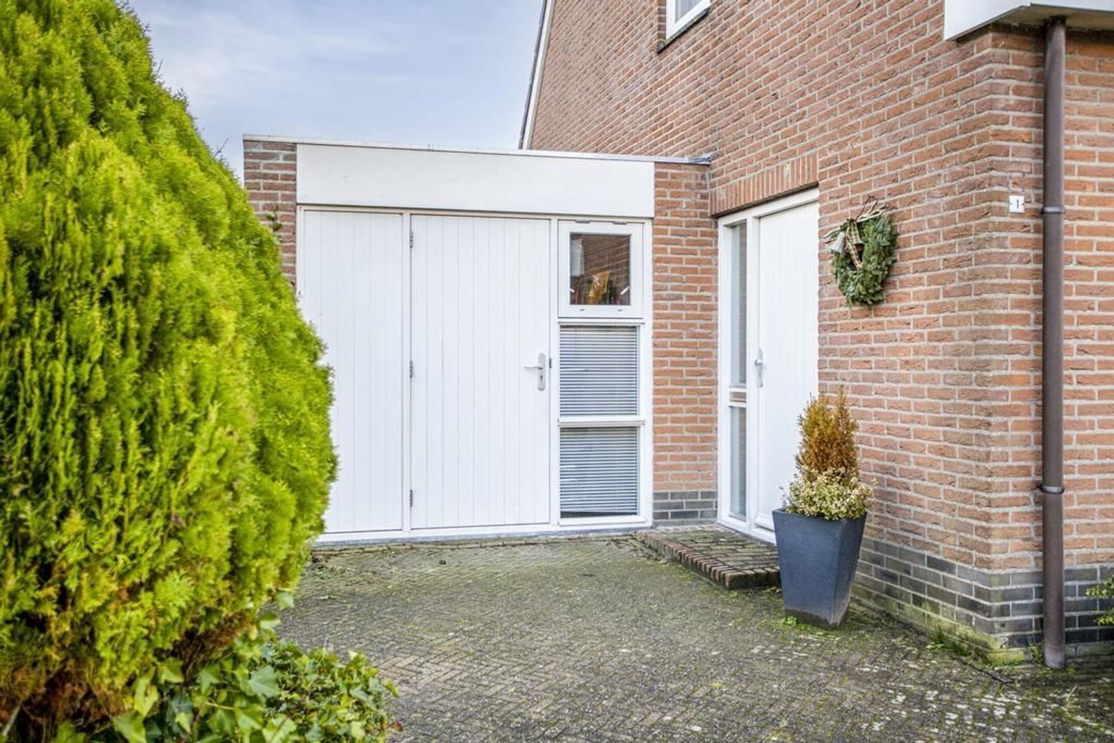 Koerierster 1, Dokkum foto-4