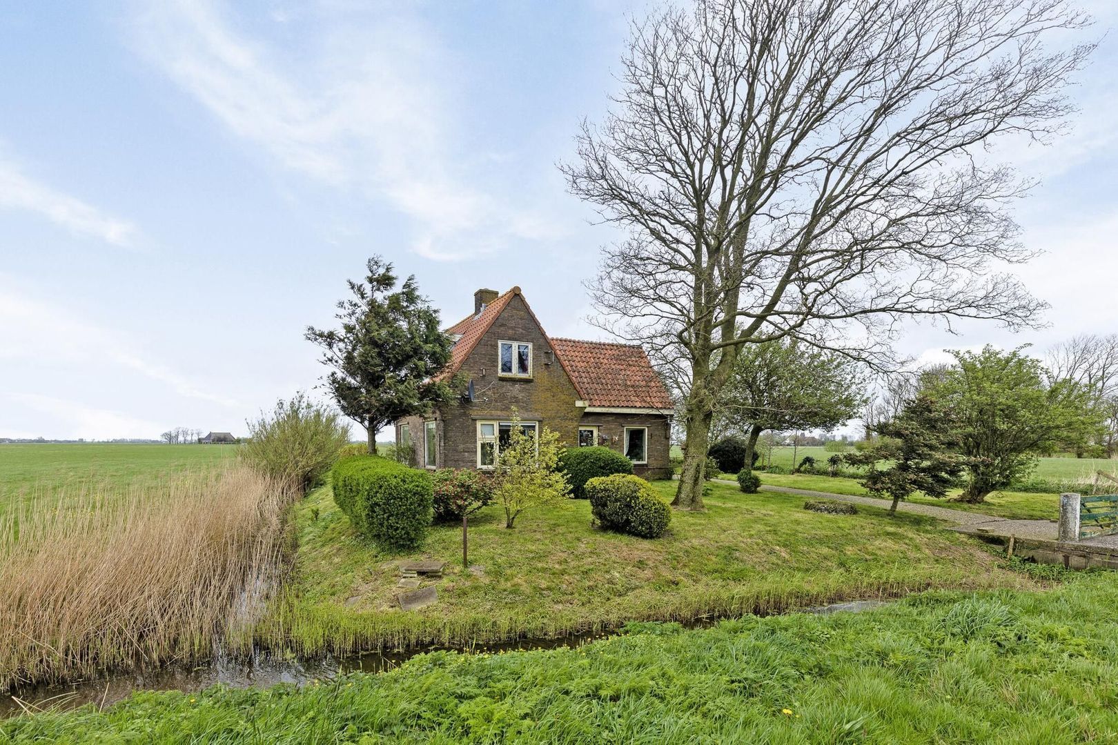 Fennewei 19, Hantumhuzen foto-1